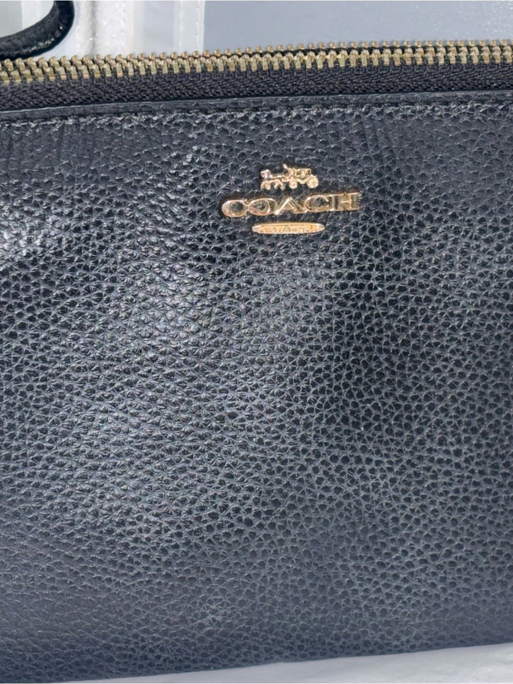 Coach Black Pebbled Leather wristlet with Gold Logo